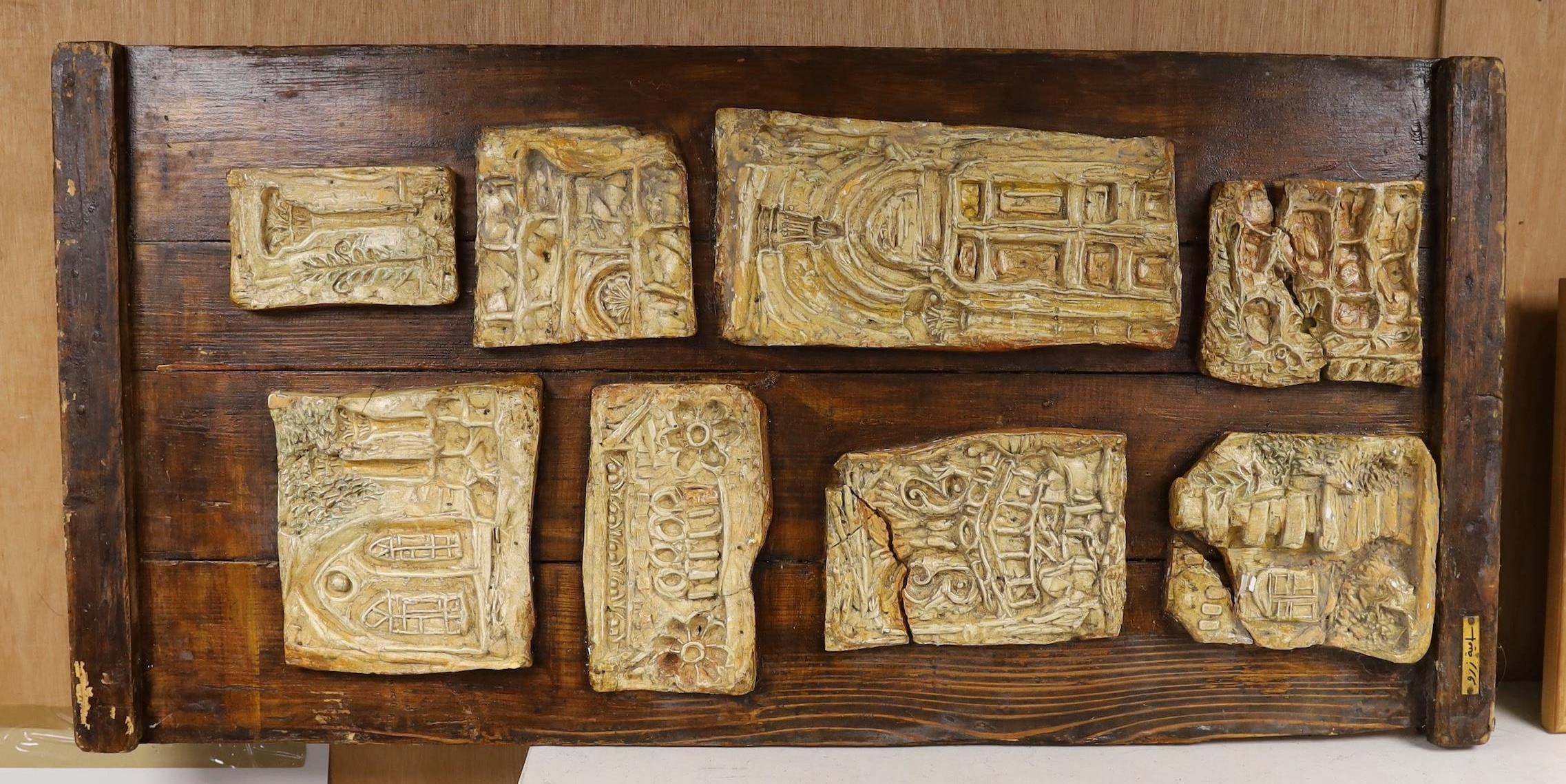 Samia Taktak Zaru (Palestinian, b. 1938), plaster on wood, 'Jerash and Salt 2005', signed, 48 x 99cm
